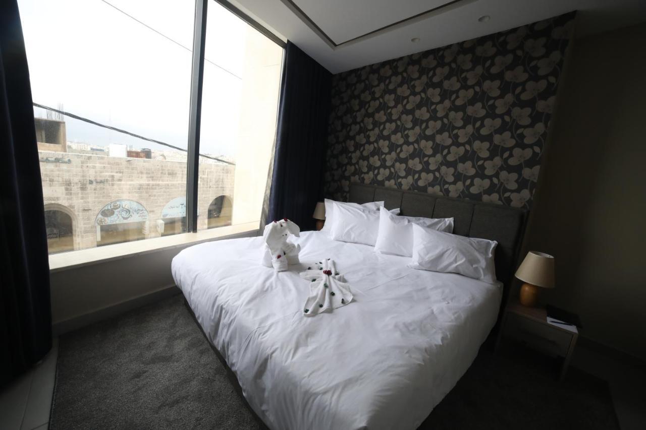 فندق صحارى الخليج Sahara Gulf Hotel Apartments Amman Extérieur photo