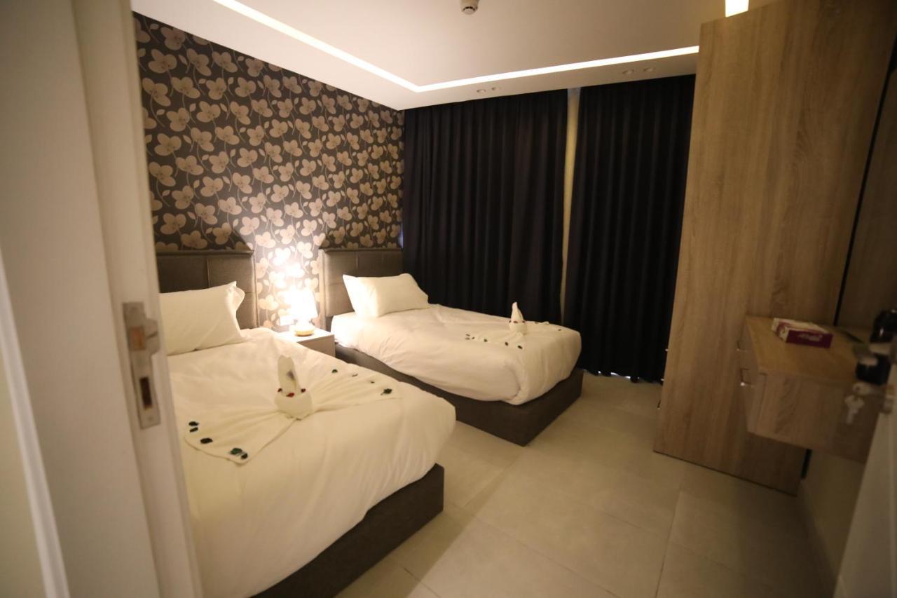 فندق صحارى الخليج Sahara Gulf Hotel Apartments Amman Extérieur photo