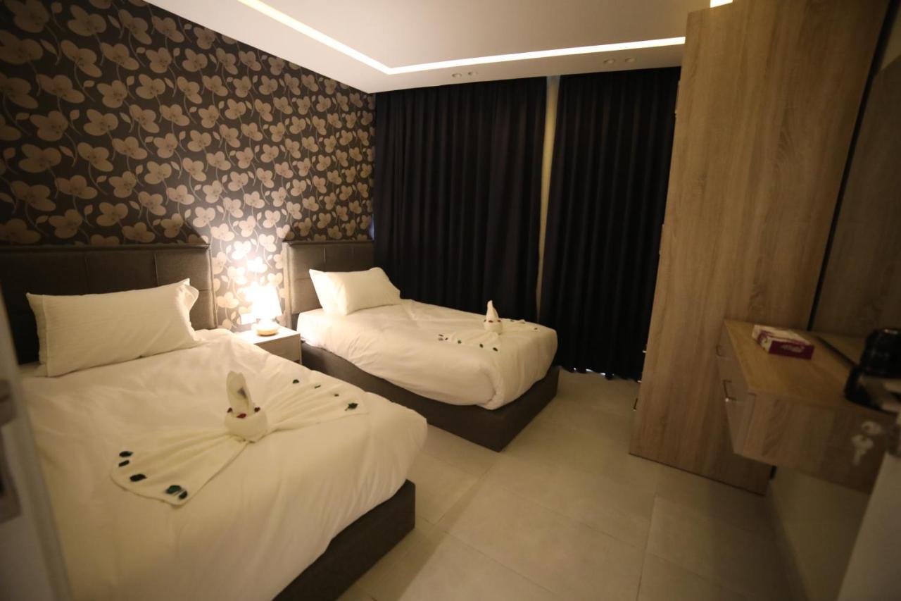 فندق صحارى الخليج Sahara Gulf Hotel Apartments Amman Extérieur photo